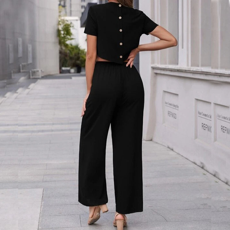 Buttoned Back Cut Out Waist Solid Jumpsuit